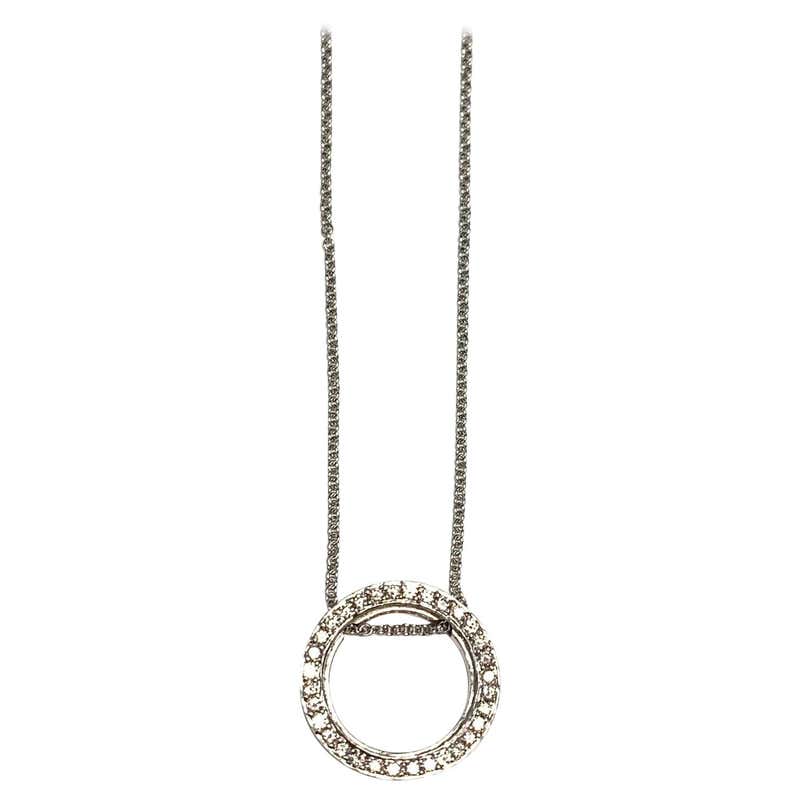 18 Carat White Gold Circular Diamond Pendant and Chain