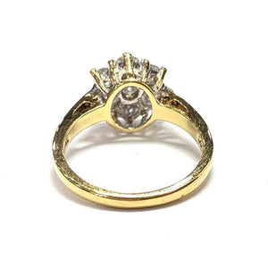 1970s 18 Carat Yellow Gold Seven Stone Diamond Cluster Ring